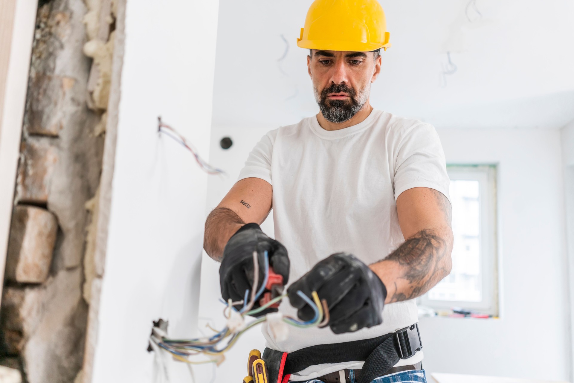 Electrician working on construction site